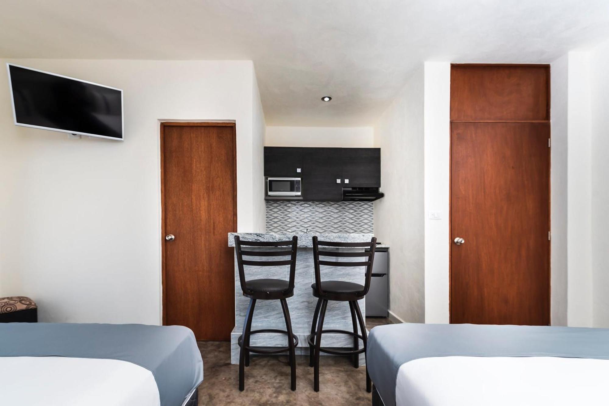 Capital O Joyma Suites, San Luis Hotel